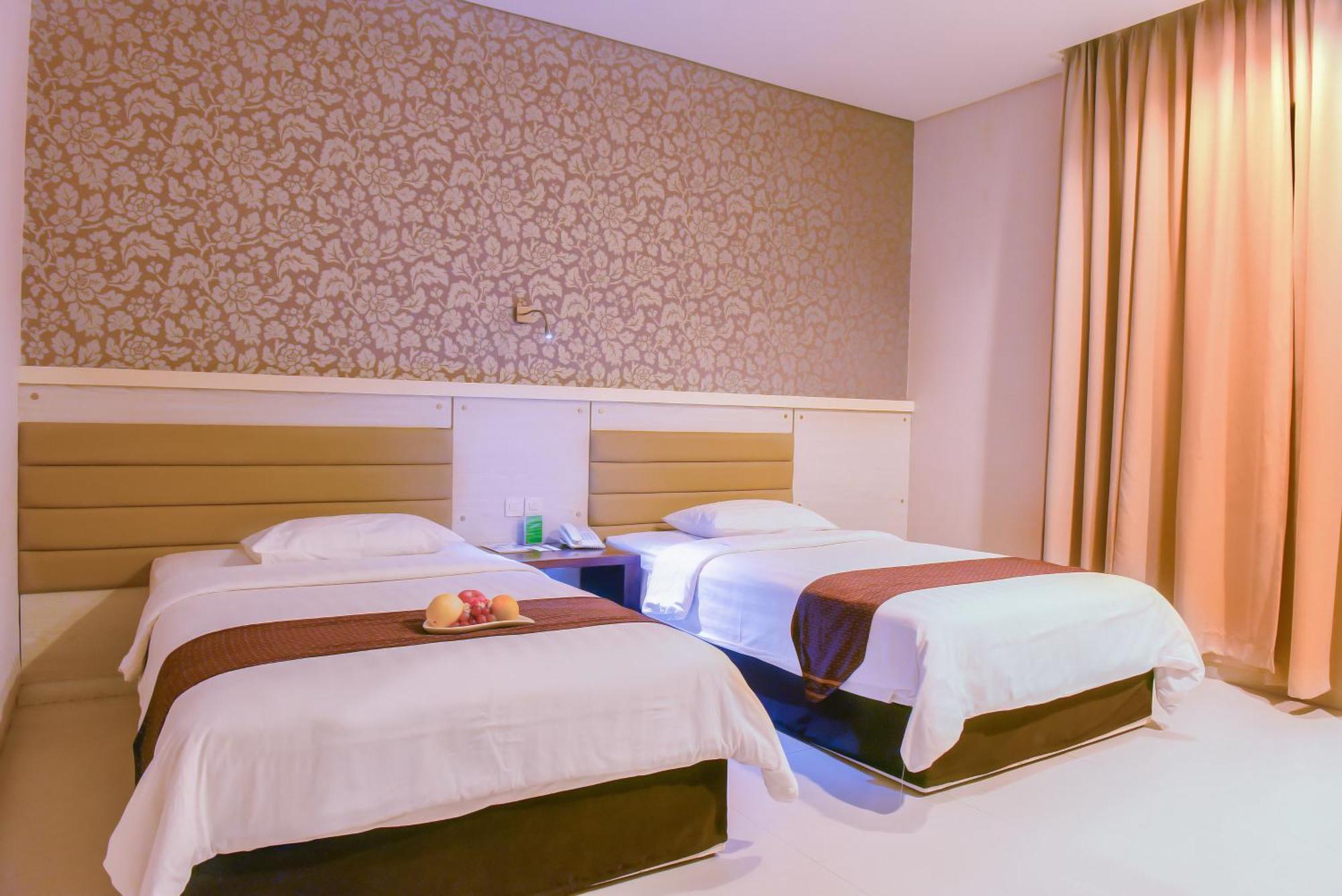 Kamar Deluxe Twin dengan Layanan Antar-Jemput Bandara Gratis
