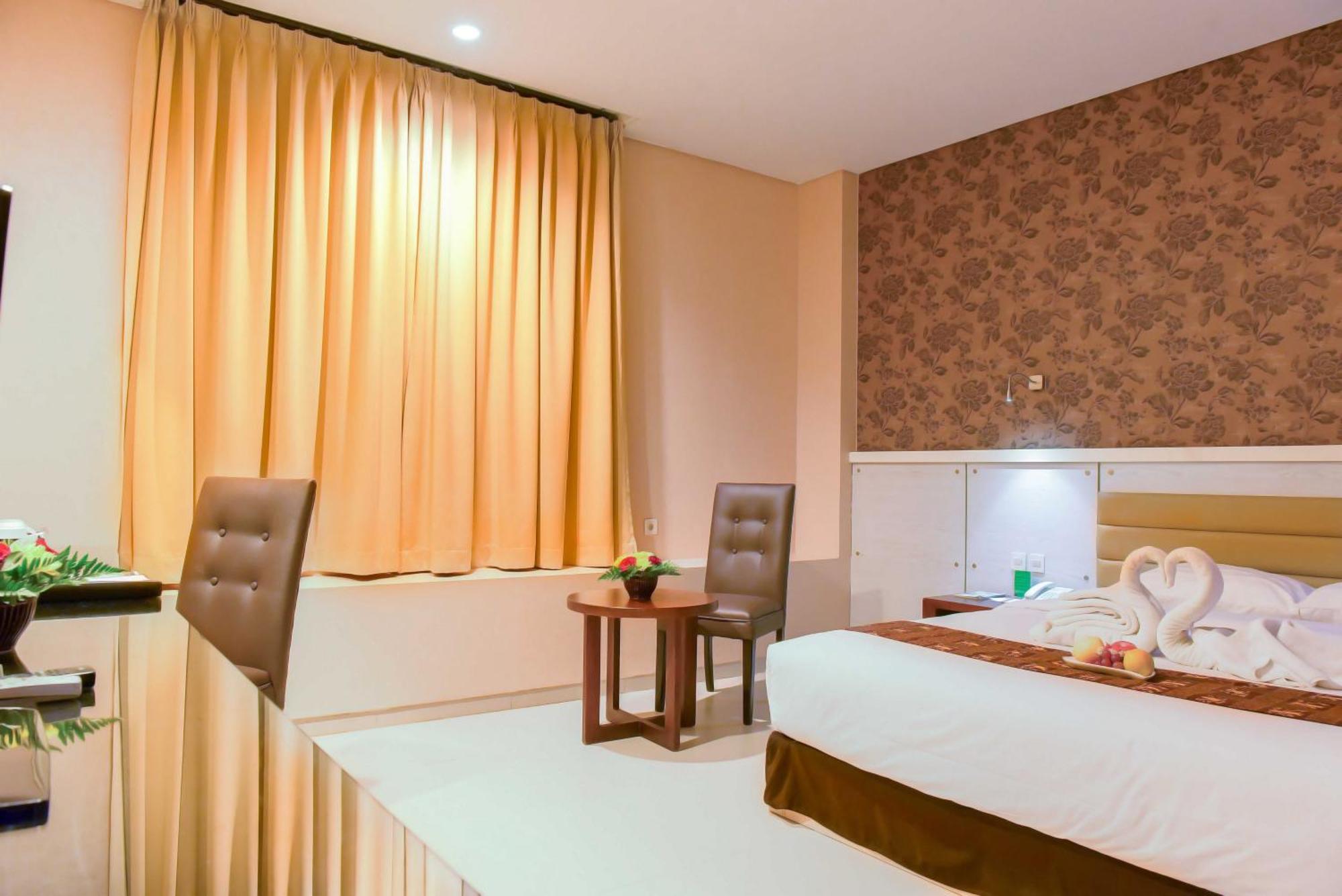 Kamar Deluxe Double dengan Antar-Jemput Bandara Gratis