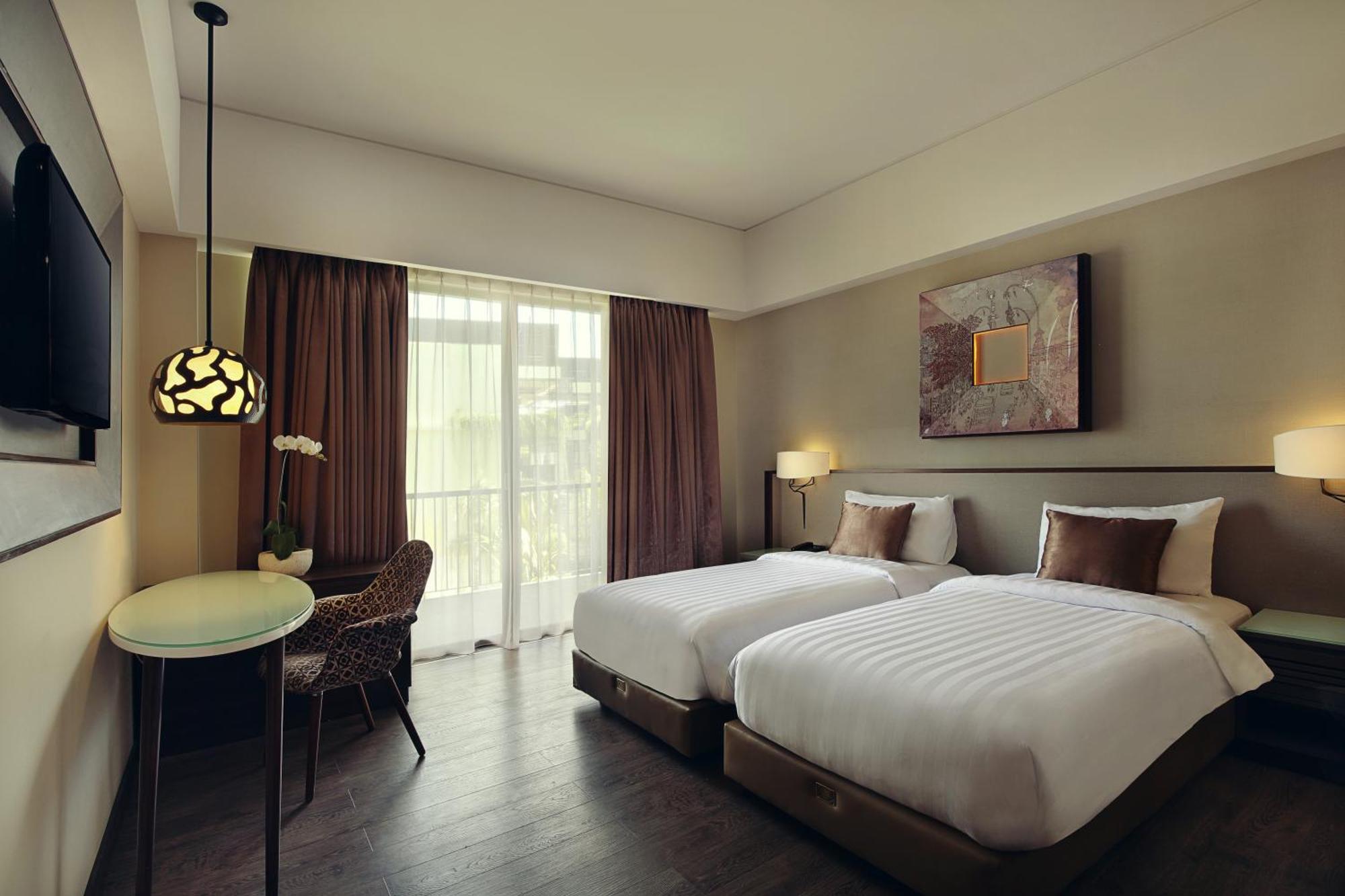 Kamar Deluxe Twin dengan Balkon