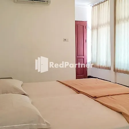 Palu City Guest House Mitra Reddoorz-2